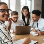 happy-young-business-colleagues-indoors_171337-757